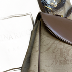 NINA RICCI Sac bandoulière taupe et bijouterie doré avec bandoulière et dustbag