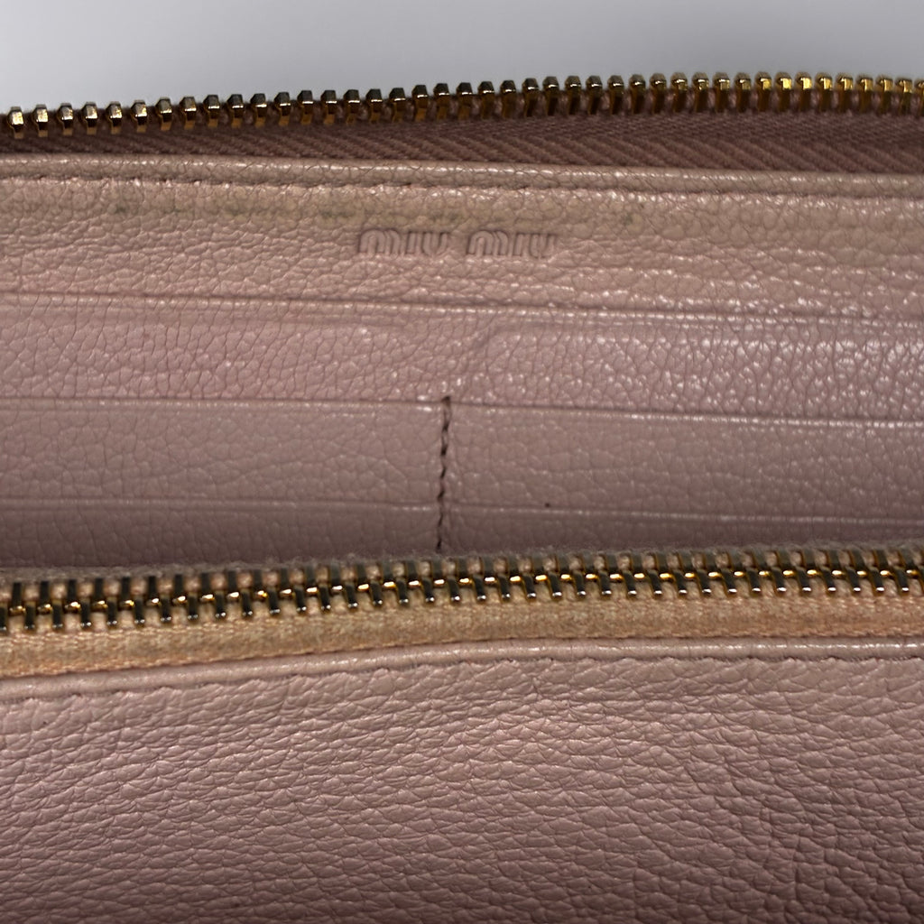 MIU MIU Portefeuille rose multifonction