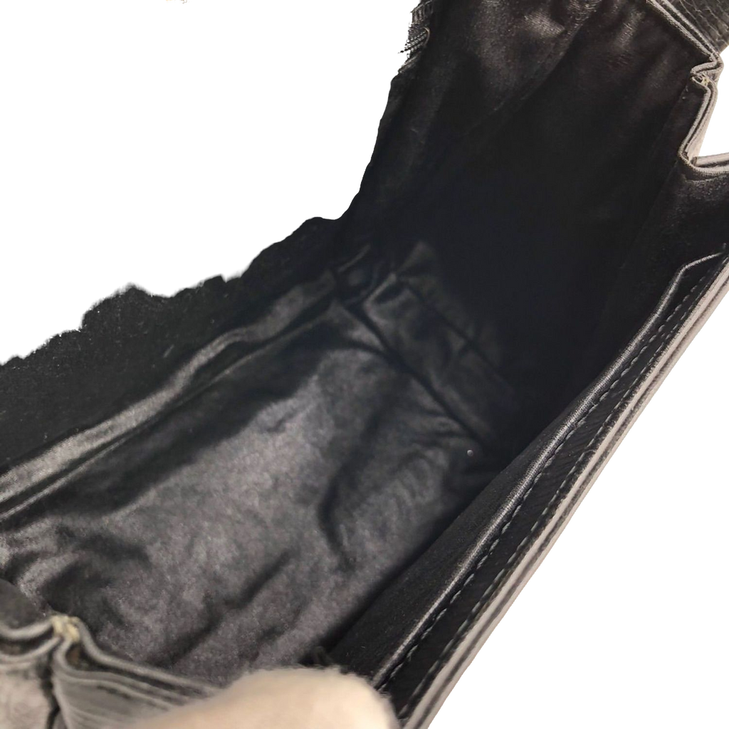 UNGARO Sac à main cuir grainé noir fermoir triangle doré