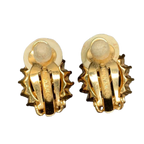 NINA RICCI Boucles d'oreilles en excellent état ornées du logo NR et de strass