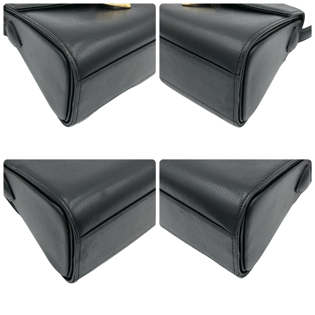 UNGARO Sac à main cuir grainé noir fermoir triangle doré