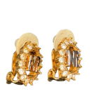 NINA RICCI Boucles d'oreilles en excellent état ornées du logo NR et de strass