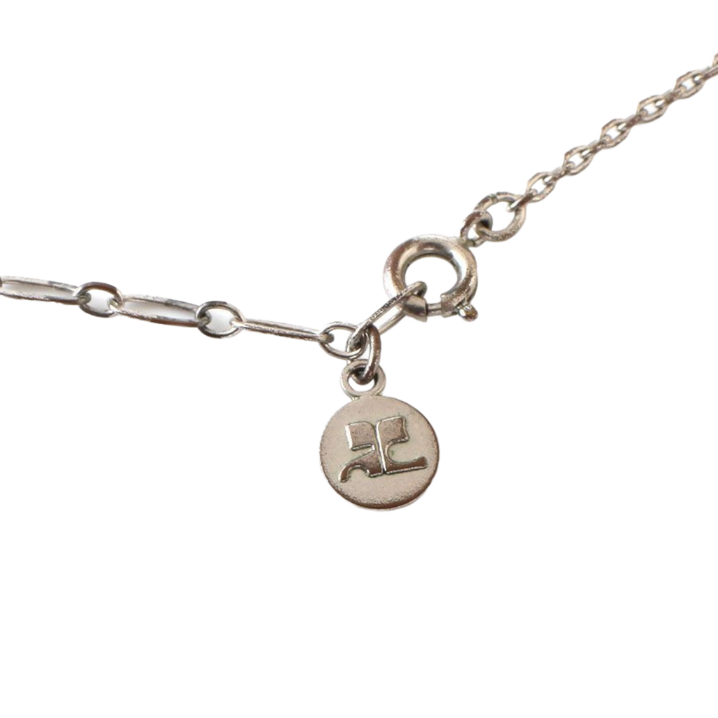 COURRÈGES Collier pendentif motif dauphin argent et or