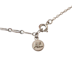 COURRÈGES Collier pendentif motif dauphin argent et or