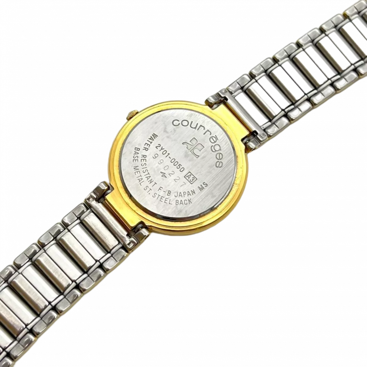 COURRÈGES Montre cadrant echec bicolor or et argent femme