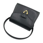 UNGARO Sac à main cuir grainé noir fermoir triangle doré