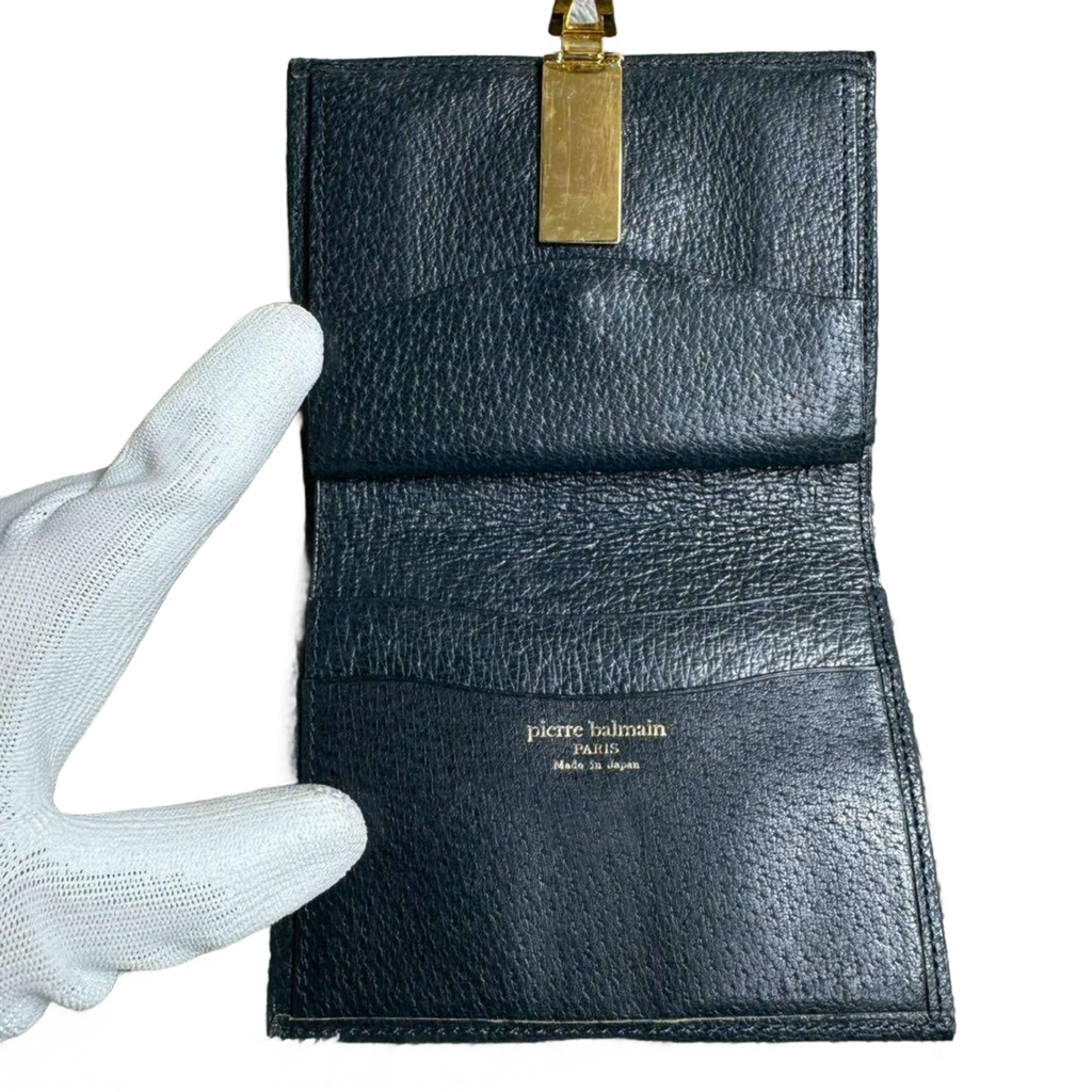 PIERRE BALMAIN Portefeuille à deux volets, orné d'un motif intégral et de finitions dorées