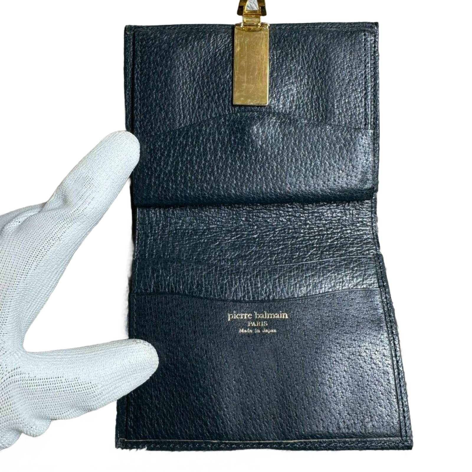 PIERRE BALMAIN Portefeuille à deux volets, orné d'un motif intégral et de finitions dorées