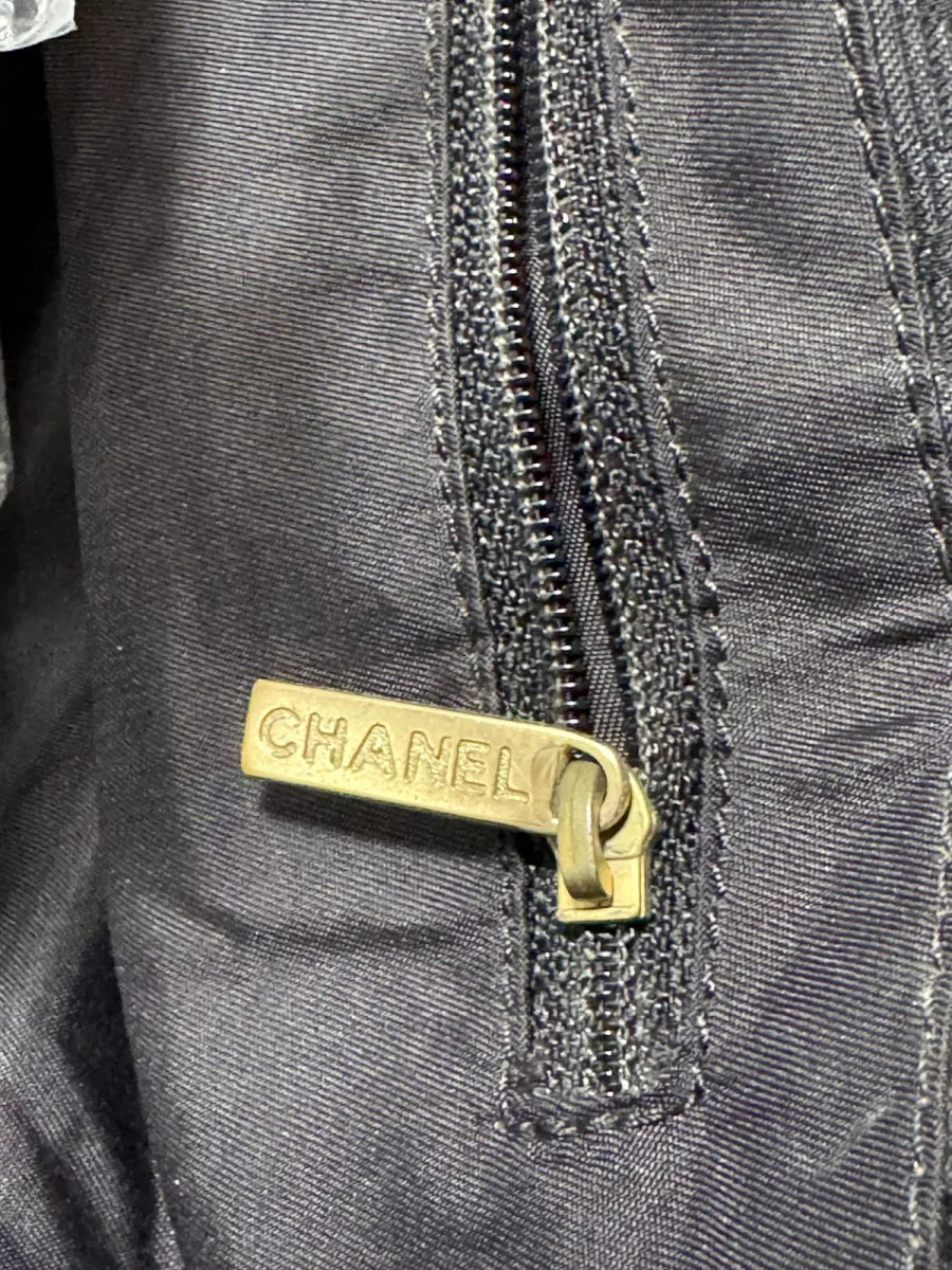 CHANEL Sac cabas Chanel New Travel Line en toile noire monogramme CC
