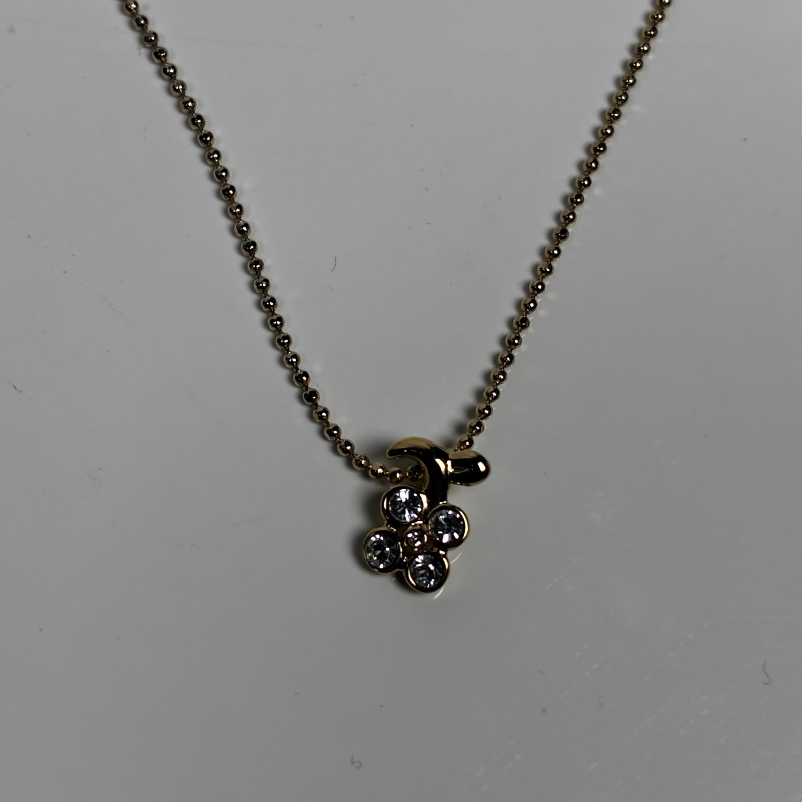 Courreges ketting met gouden bloem