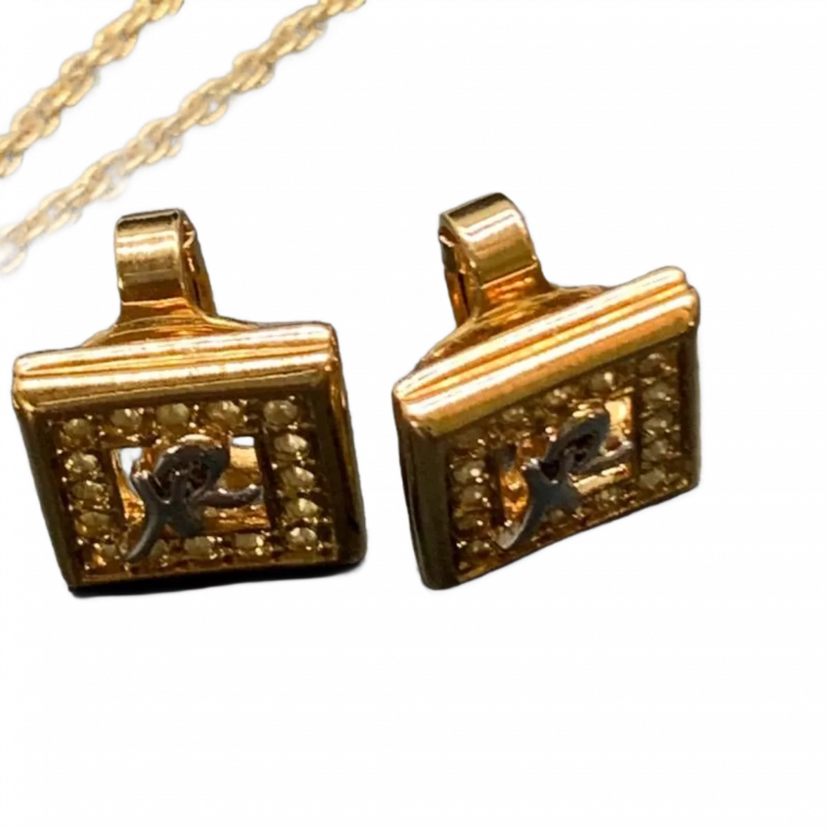 NINA RICCI LOTX2 Nina Ricci (collier et boucles d'oreilles) couleur or logo strass.  vendu à l'unité