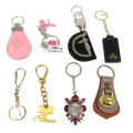 Assorted Brand Keychain Lot: Rawhide, CH, Dooney & Bourke, Trussardi, Firenze