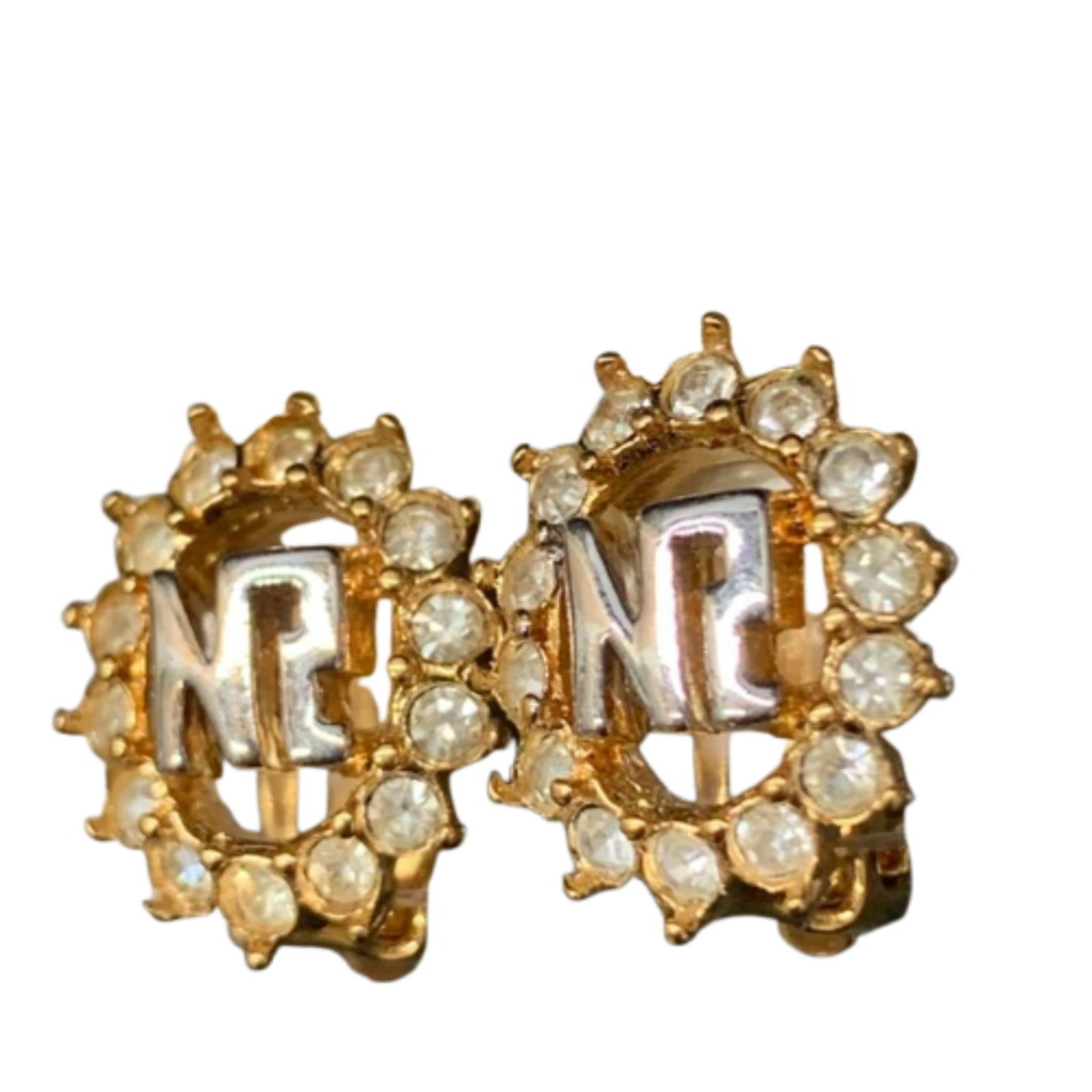 NINA RICCI Boucles d'oreilles en excellent état ornées du logo NR et de strass