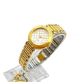 COURRÈGES Montre cadrant echec bicolor or et argent femme