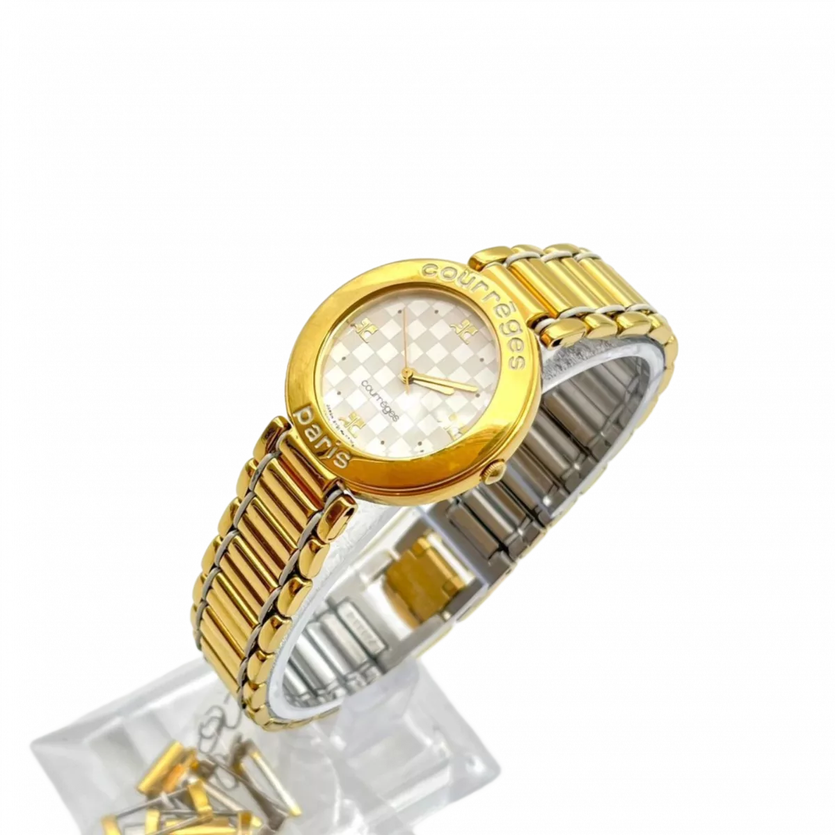 COURRÈGES Montre cadrant echec bicolor or et argent femme