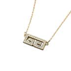 GIVENCHY Collier en or, logo, bijoux en strass, en excellent état
