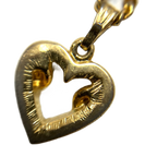 COURRÈGES Collier Pendentif Or Coeur entrelassé et strass Logo