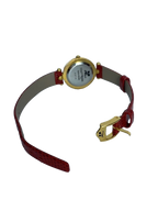 COURRÈGES Montre femme cadran blanc boîtier or bracelet cuir rouge lézard Swiss Made
