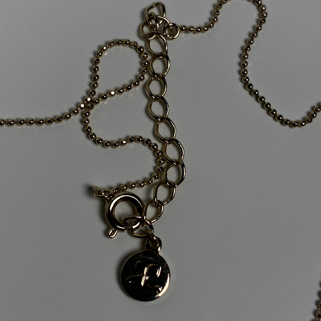 Courreges gold flower necklace