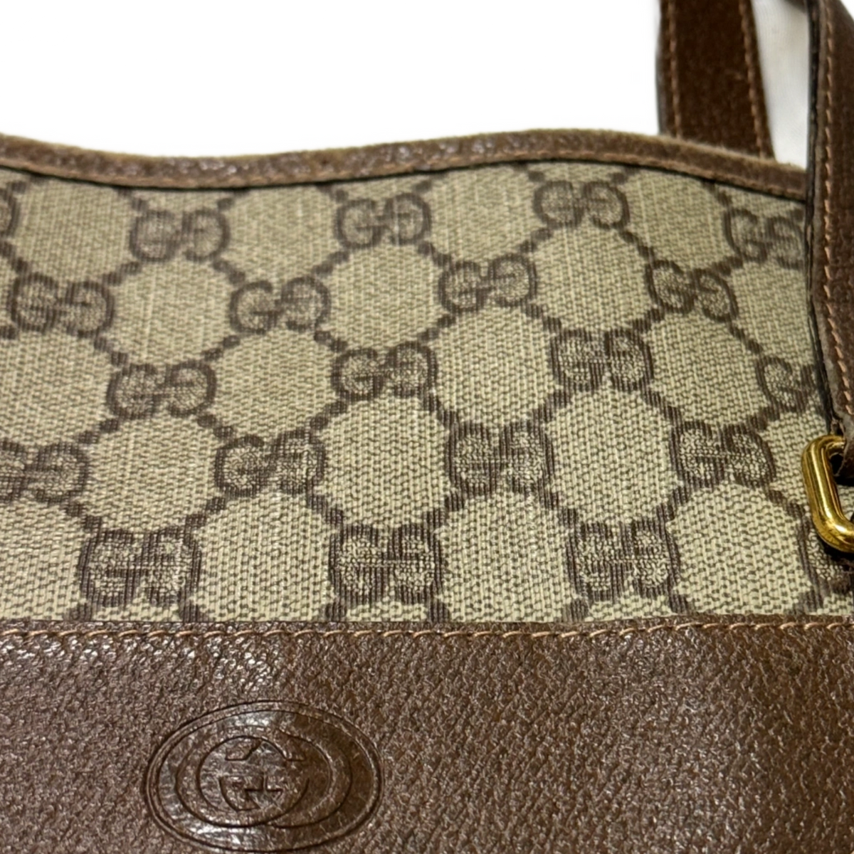 GUCCI Sac cabas monogrammé GG Supreme logo embossé anse longue cuir marron