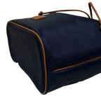 COURRÈGES Sac noé bucket bag bleu marine / camel (avec dustbag)