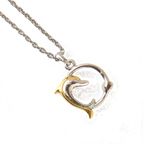 COURRÈGES Collier pendentif motif dauphin argent et or