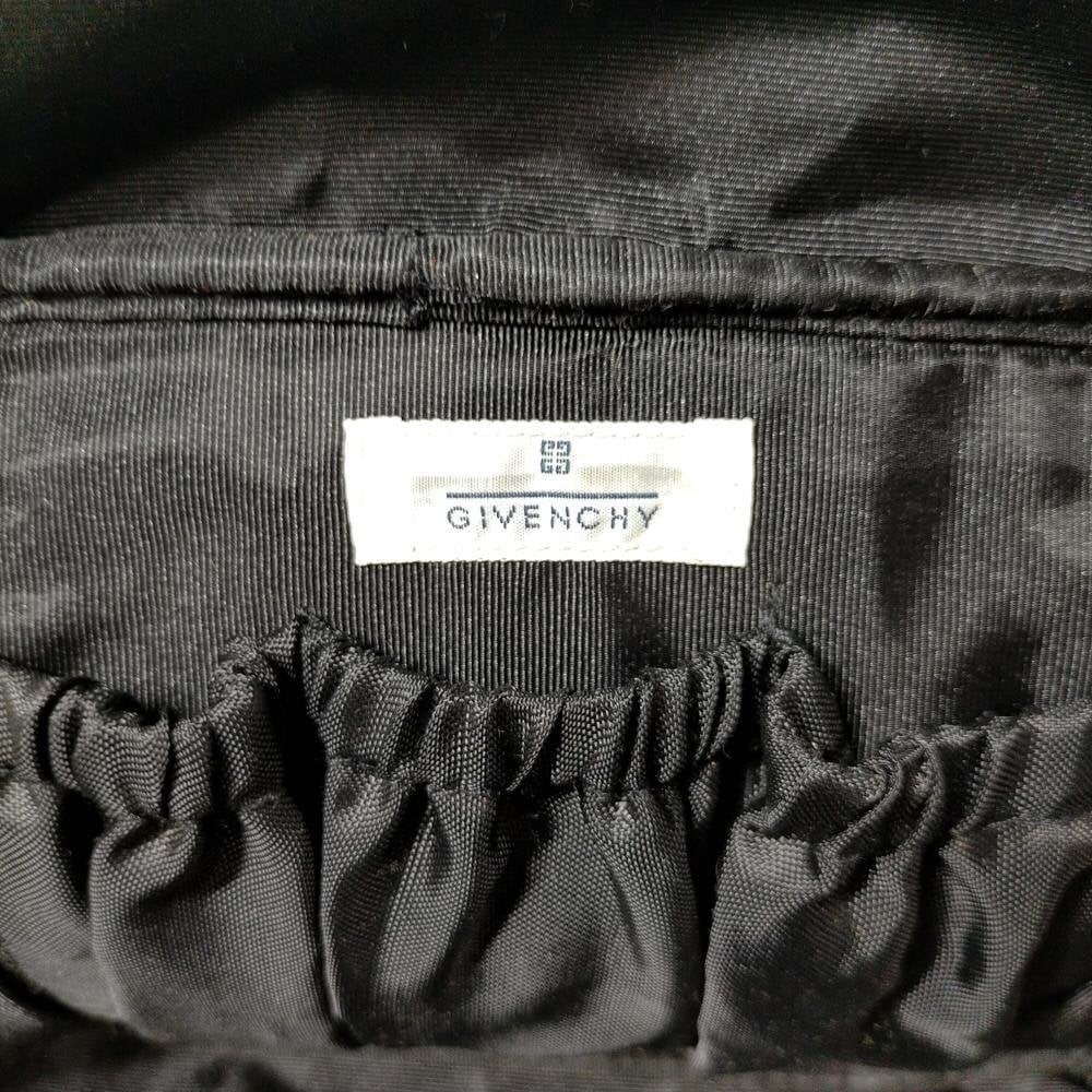 GIVENCHY Pochette de toilette à motif diamant noir et strass