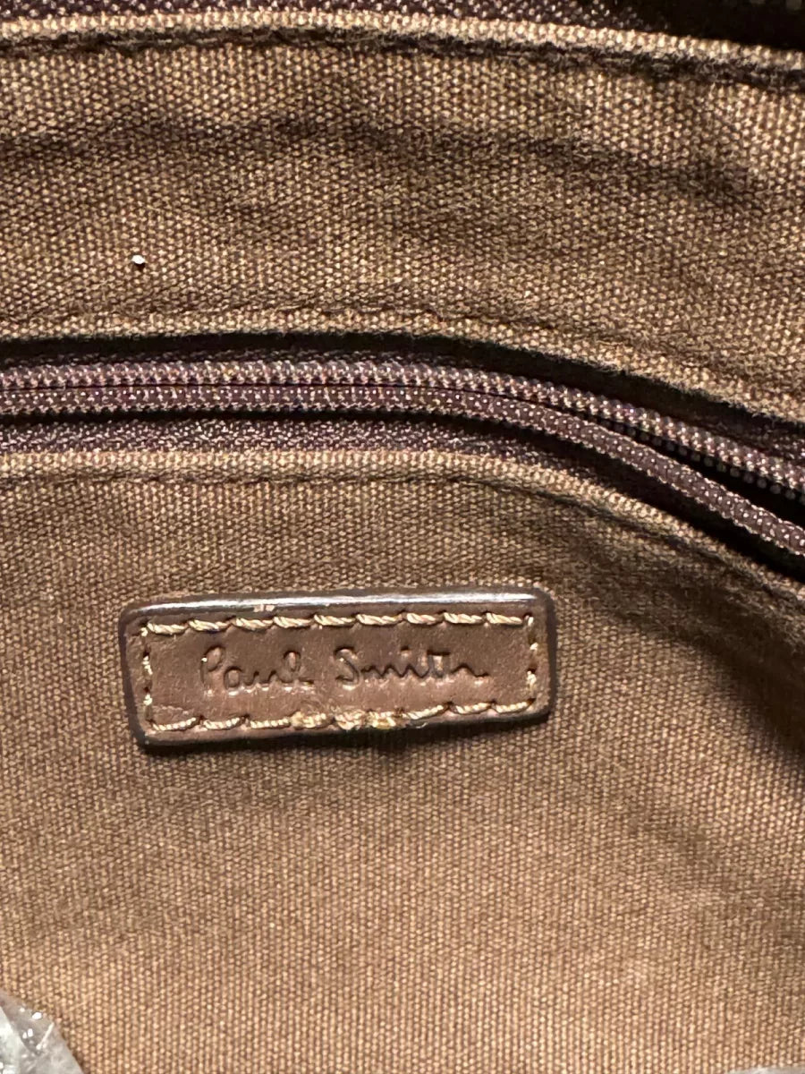 Paul Smith Sac en toile beige est doté de lanières en cuir marron