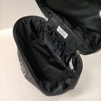 GIVENCHY Pochette de toilette à motif diamant noir et strass