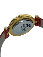 COURRÈGES Montre femme cadran blanc boîtier or bracelet cuir rouge lézard Swiss Made