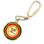 COURRÈGES Porte-clés rond vert rouge jaune logo ac