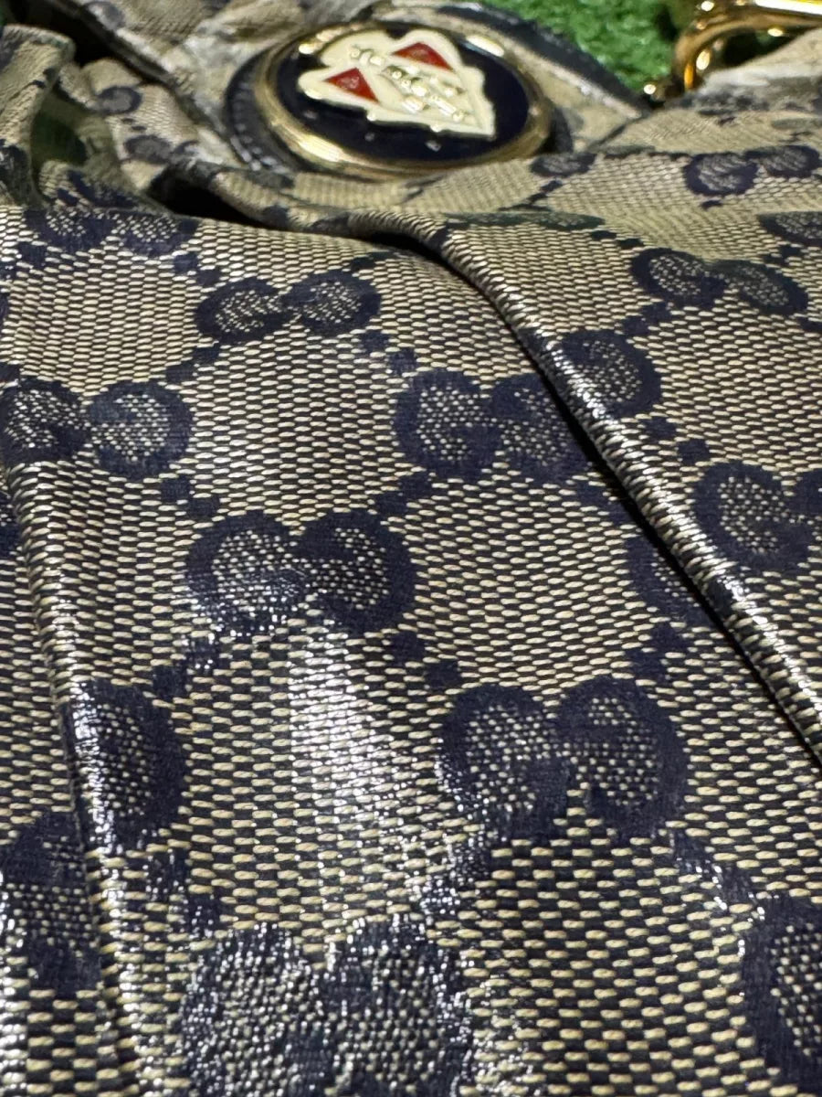 GUCCI Sac hobo Gucci Hysteria sur motif monogramme GG wcarte/carnet