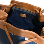 COURRÈGES Sac noé bucket bag bleu marine / camel (avec dustbag)