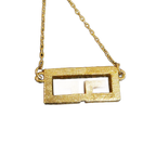GIVENCHY Collier Givenchy, 1977, logo G, strass, or, excellent état, rare.