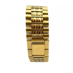 COURRÈGES Montre cadrant echec bicolor or et argent femme