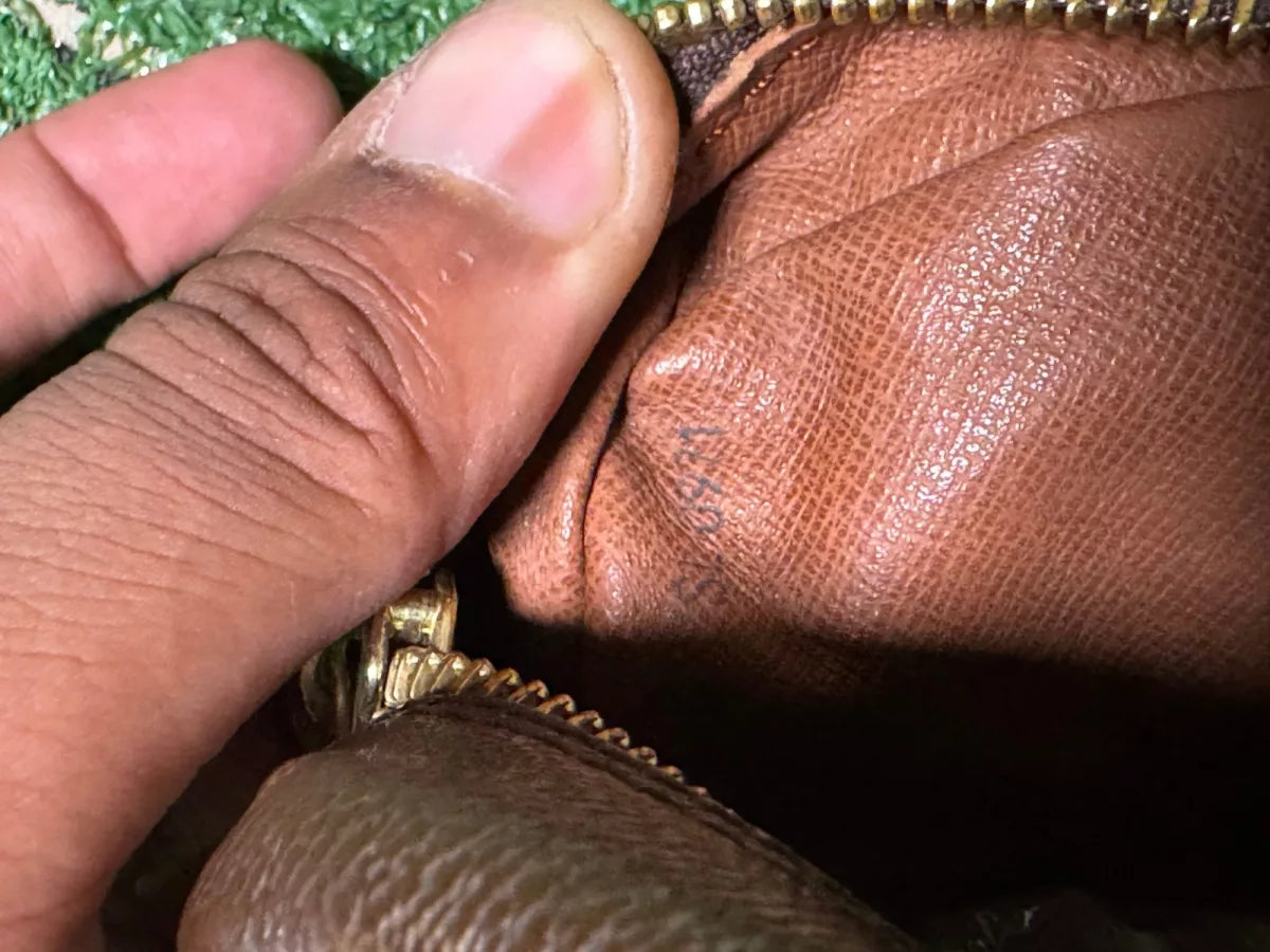LOUIS VUITTON Pochette Trocadéro en toile Monogram