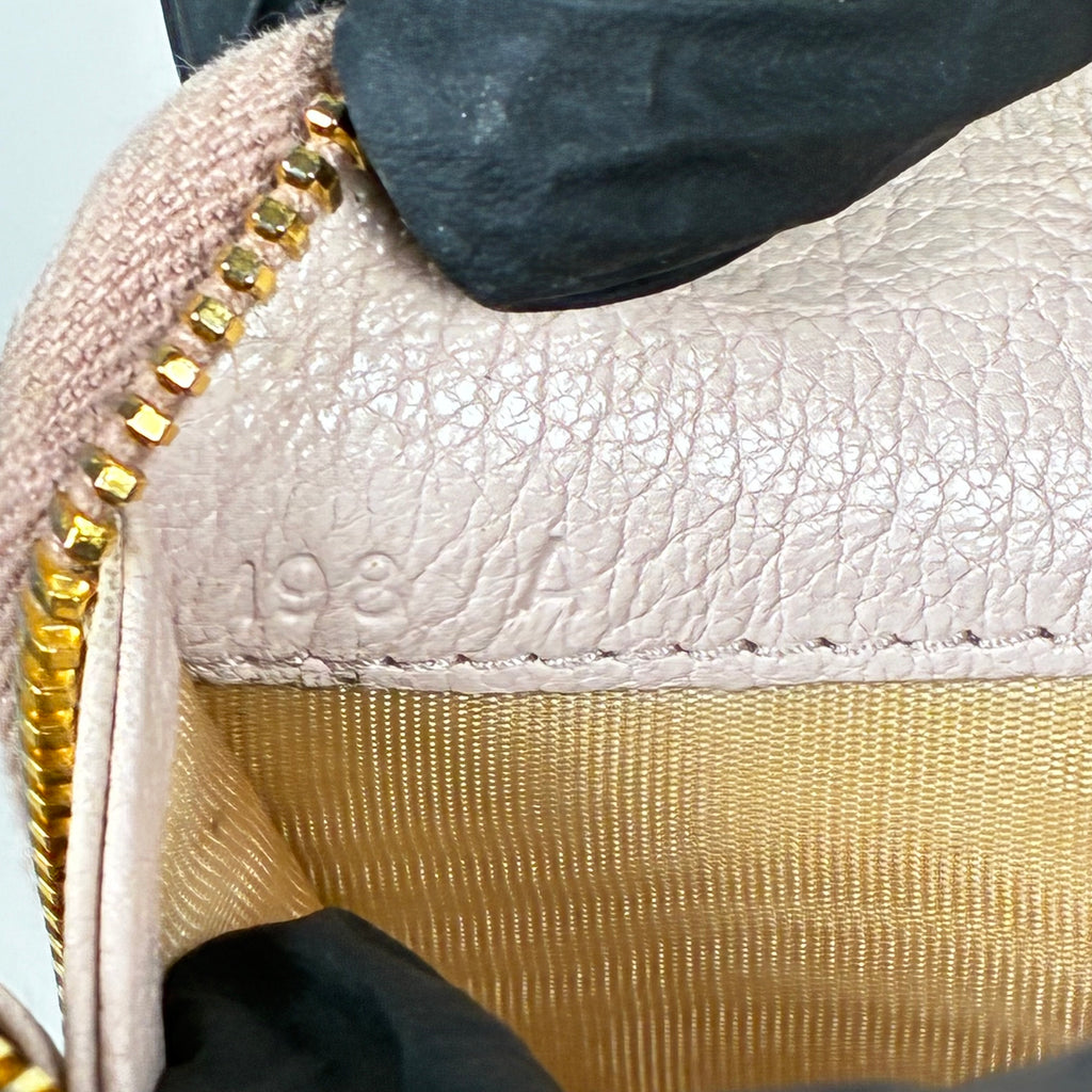 MIU MIU Portefeuille rose multifonction