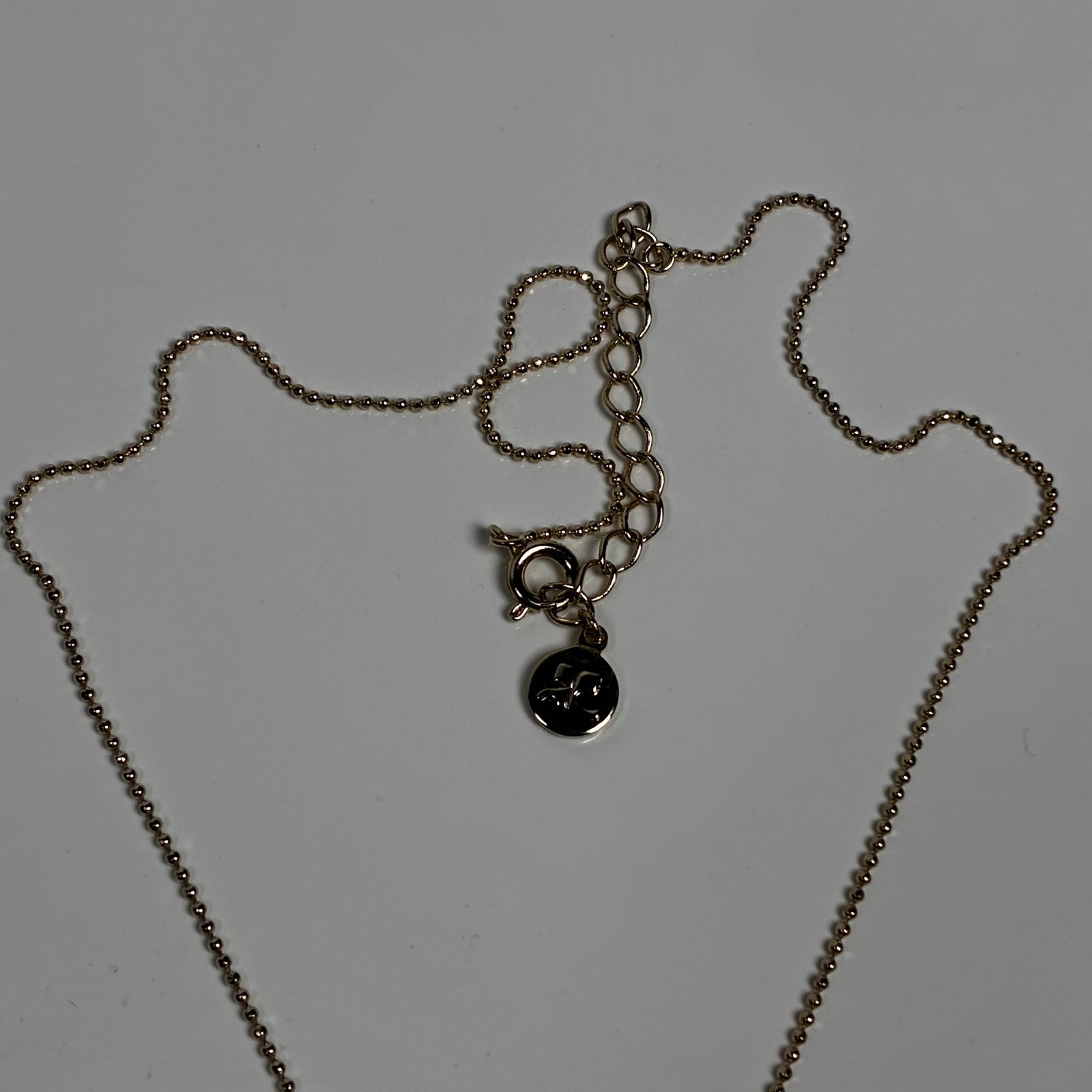 Courreges ketting met gouden bloem