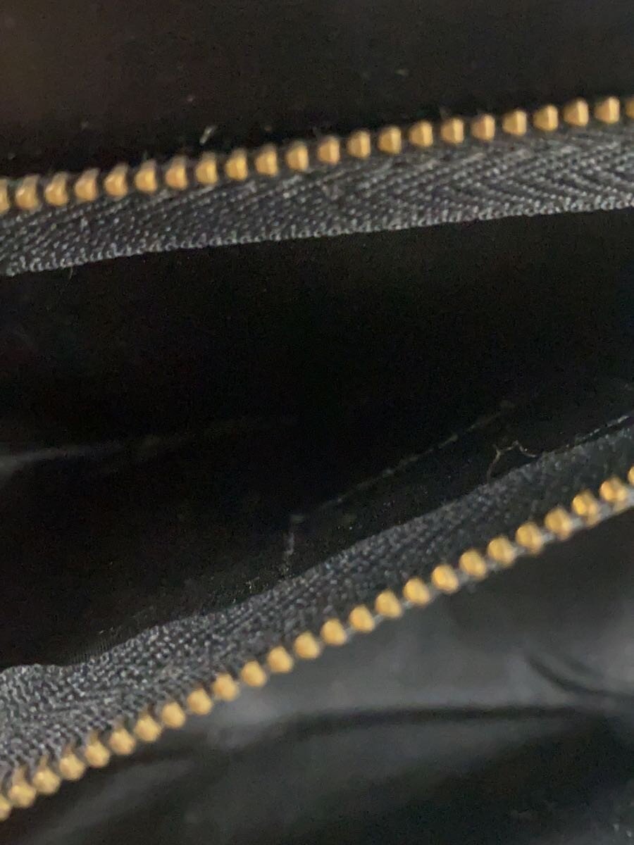 COURRÈGES Sac Uvara cuir noir lisse nœud doré