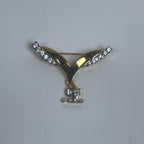Courreges victory-shaped brooch