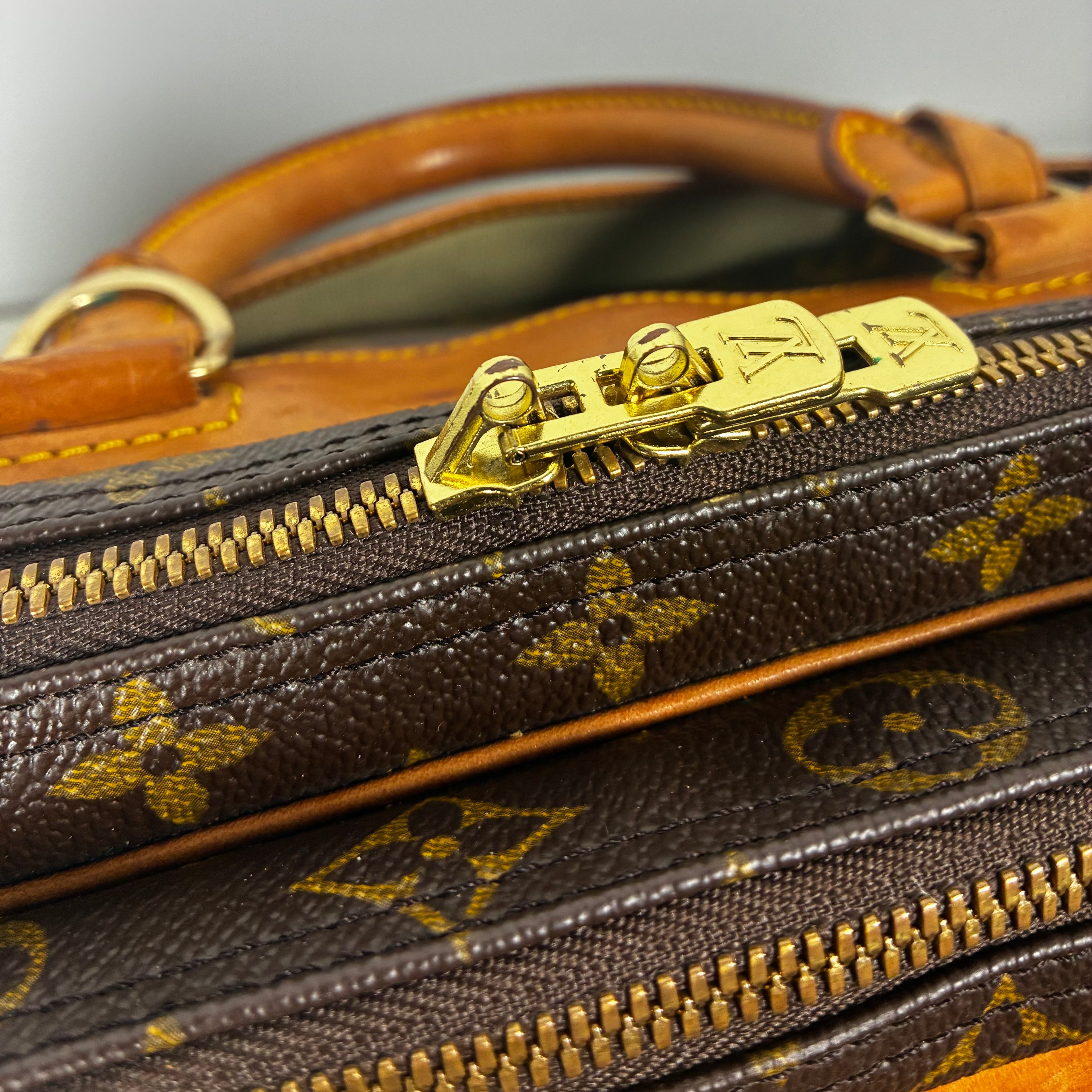 Louis Vuitton Sac de voyage Alizé en toile Monogram