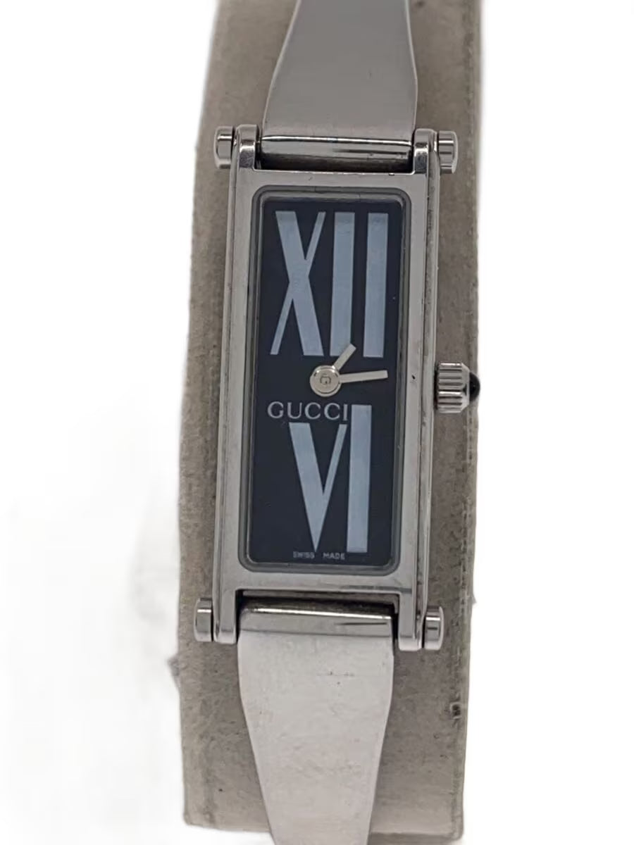 GUCCI Montre femme bracelet acier bangle cadran noir chiffres romains Swiss Made