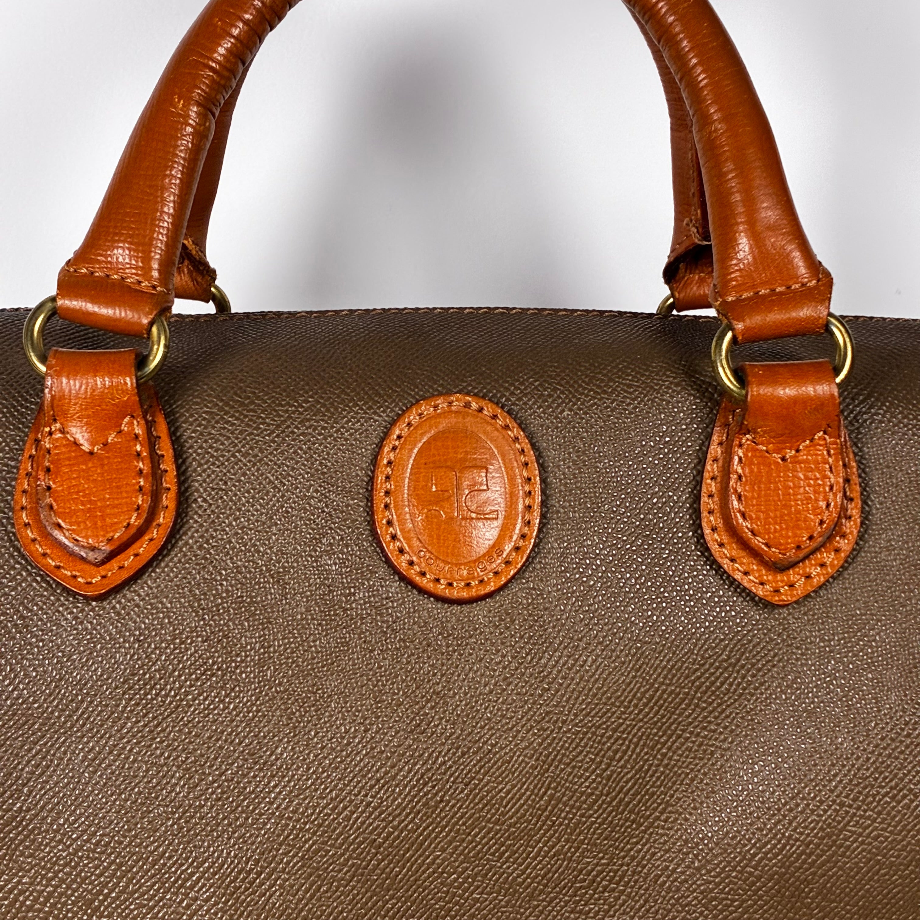 Courrèges Sac Mini Boston en toile enduite marron et cuir cognac