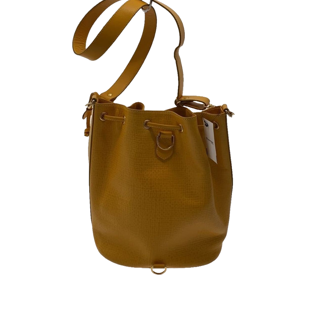 COURRÈGES Sac noé bucket bag cuir jaune moutarde