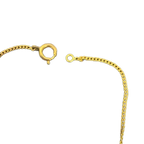 COURRÈGES Collier en or logo ac et milieux avec pendentif façon diamant