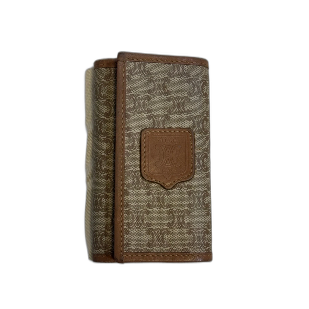 CELINE Porte-clé Céline triomphe avec cuir cognac et logo embossé