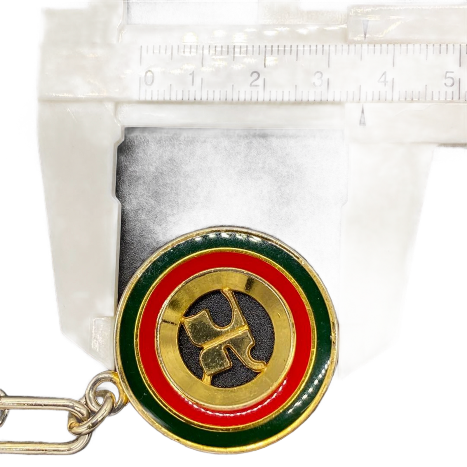 COURRÈGES Porte-clés rond vert rouge jaune logo ac
