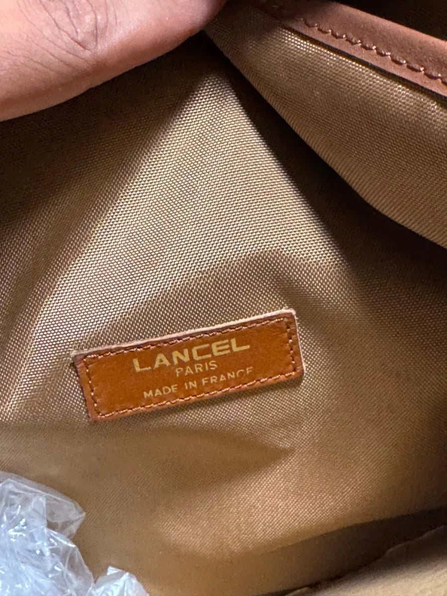LANCEL Sac de voyage Lancel vintage en toile beige et logo L
