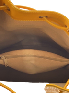 COURRÈGES Sac noé bucket bag cuir jaune moutarde