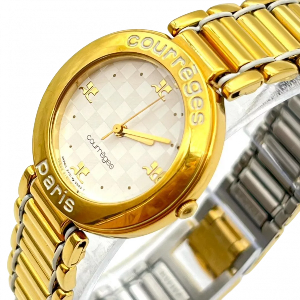COURRÈGES Montre cadrant echec bicolor or et argent femme